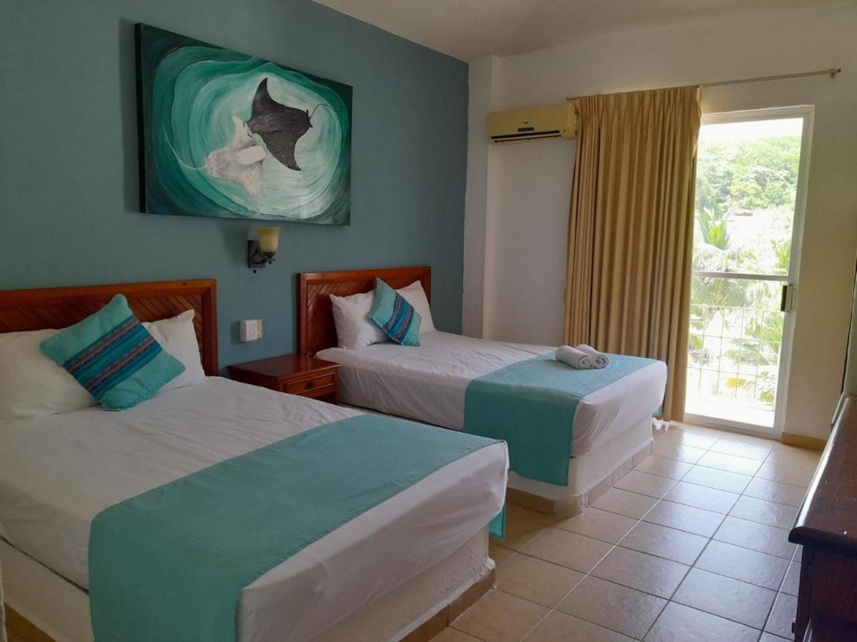 Hotel Arenas Del Pacifico 산타크루즈휴에튤코 외부 사진